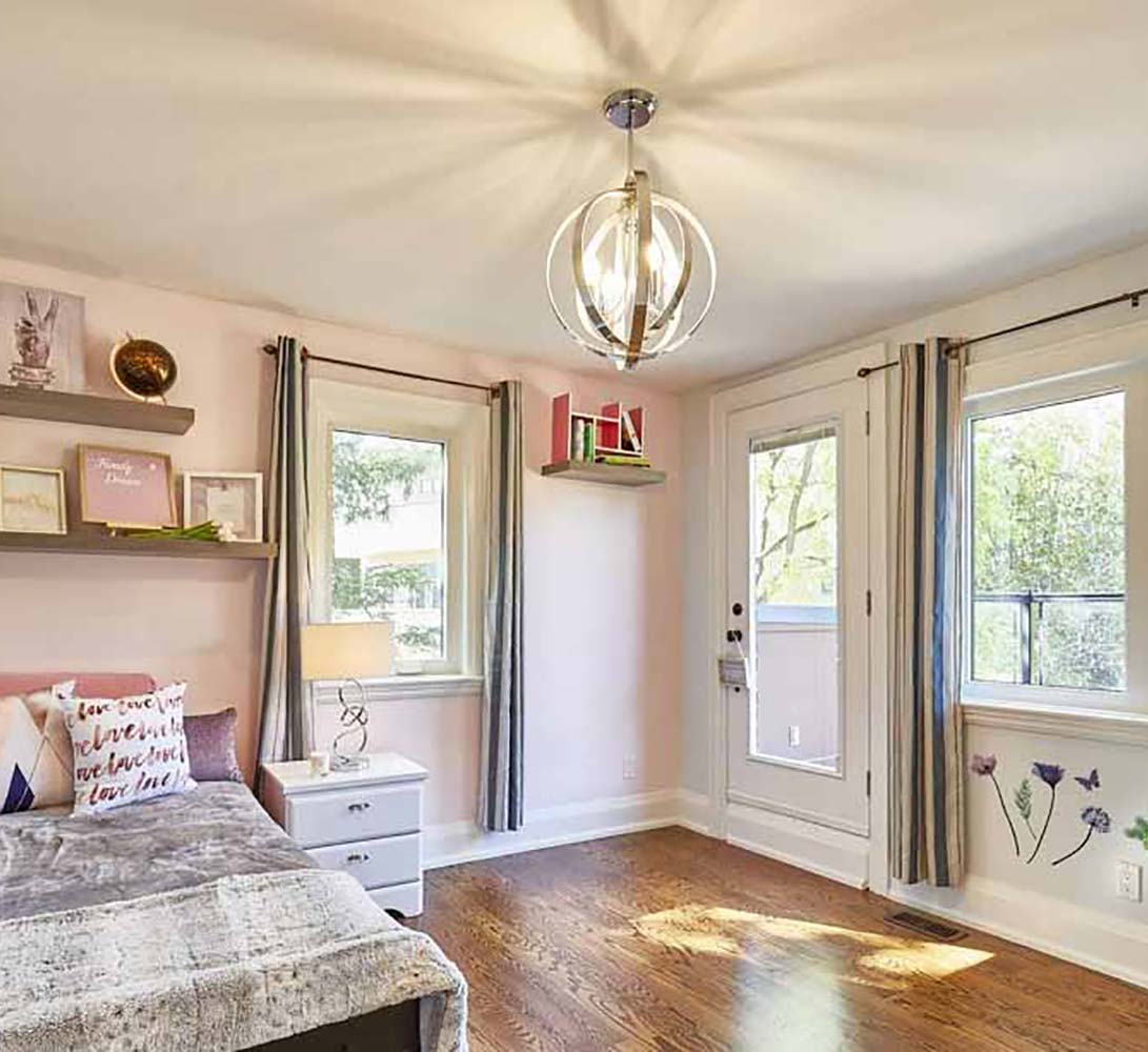 Bedroom with globe chandelier with rhinestones