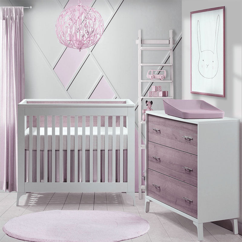 Pink chandelier in nursery room, pink nursery room with pink chandelier