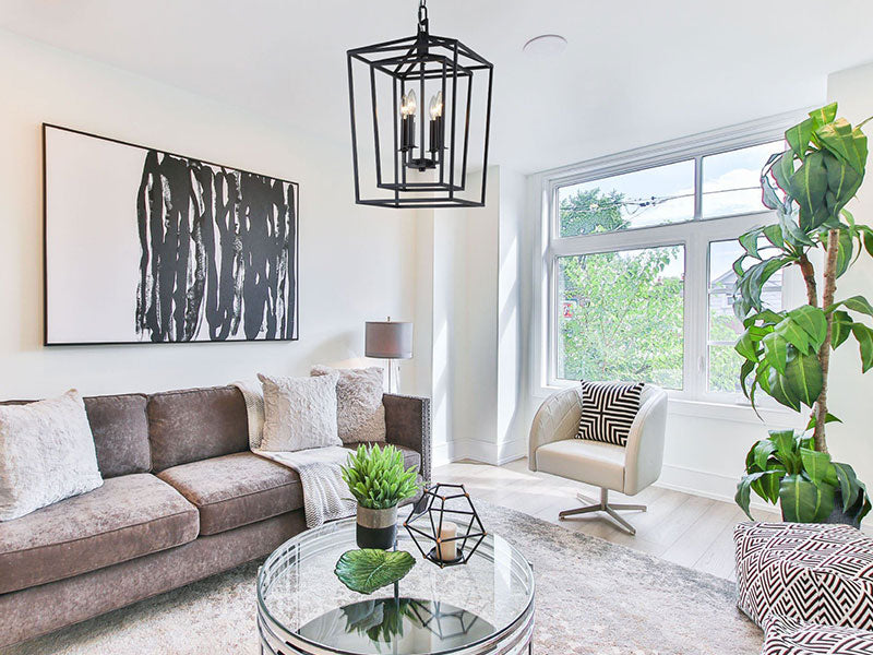 Black lantern chandelier in living room, Black cage chandelier in living room