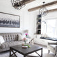 modern living room with black geometric chandelier