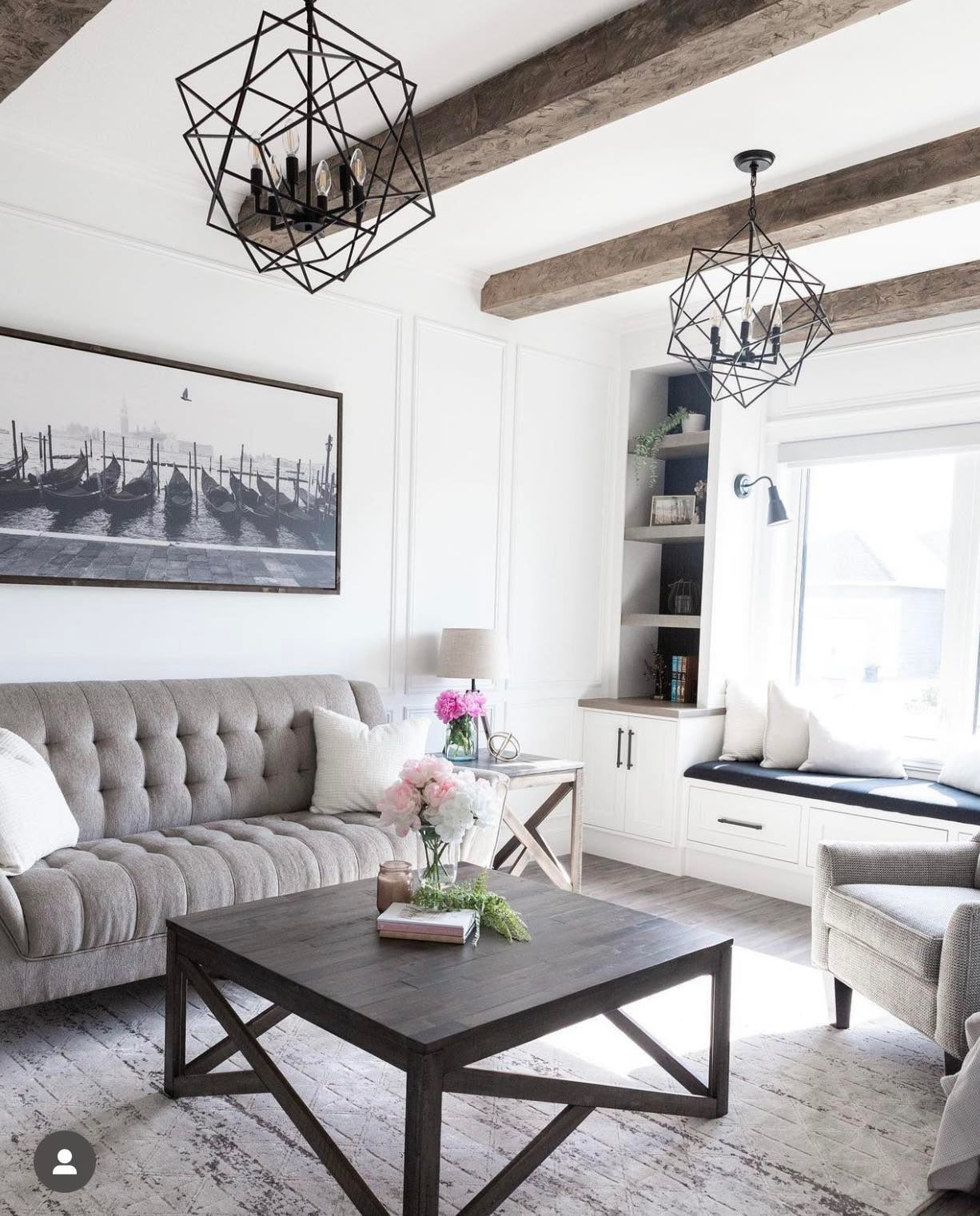modern living room with black geometric chandelier