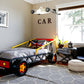 kids room with a race car chandelier, kids bedroom with car ceiling light