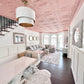 dining room with white and gold chandelier, pink room with white chandelier