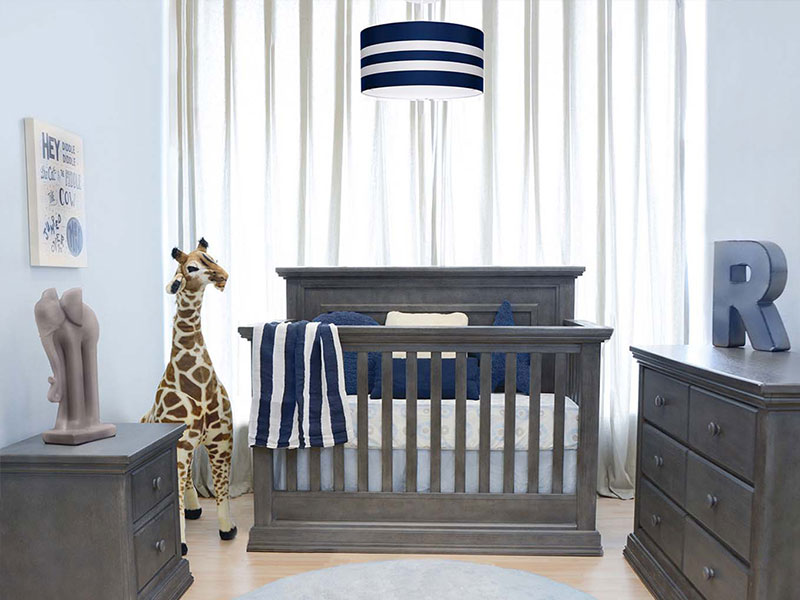 Navy and white ceiling light in a nursery room