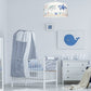 kids nursery with under the sea theme, nursery with ocean theme decor, kids room with ocean light fixture