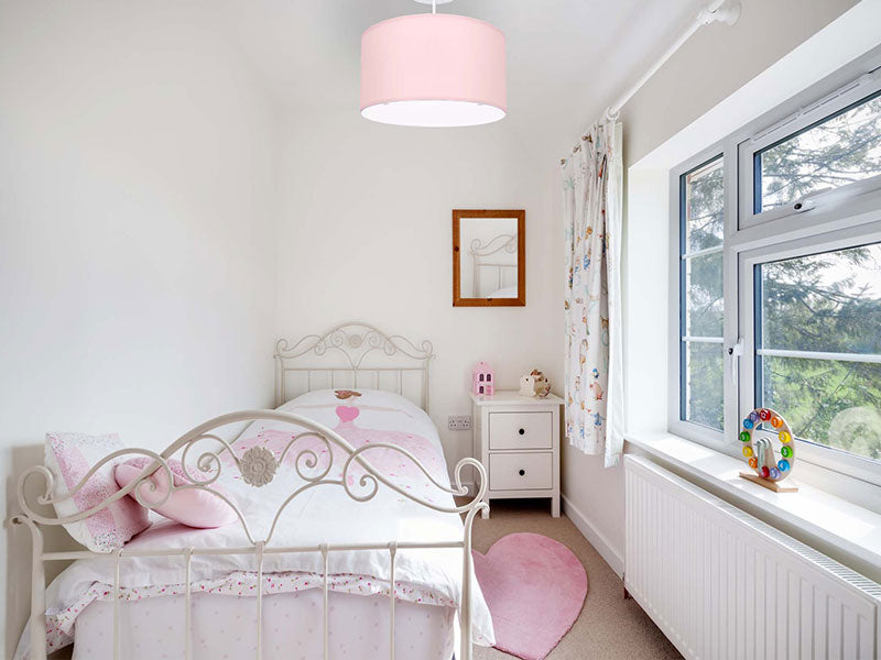 pink ceiling light in girls bedroom