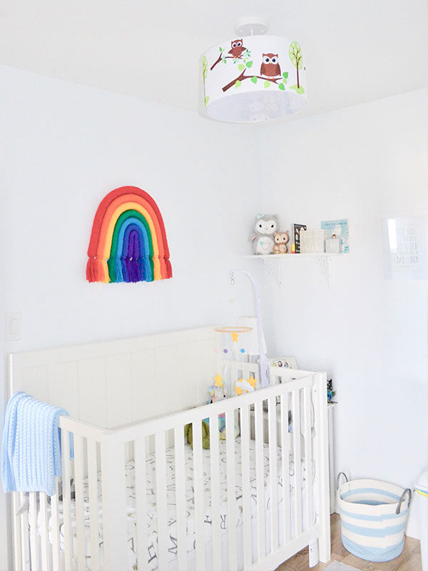 Owl light fixture in baby's room