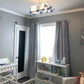 Nursery room with train chandelier, nursery bedroom with train light fixture
