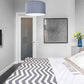 bedroom with grey light fixture
