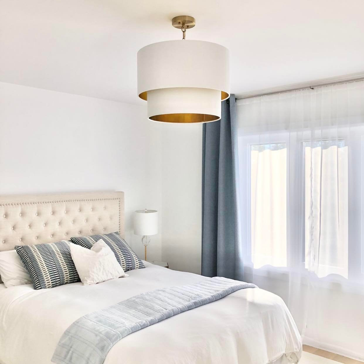 bedroom with white and gold chandelier, white light fixture, bedroom light fixture, white ceiling light, bedroom lighting