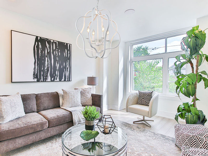 Modern living room with white chandelier